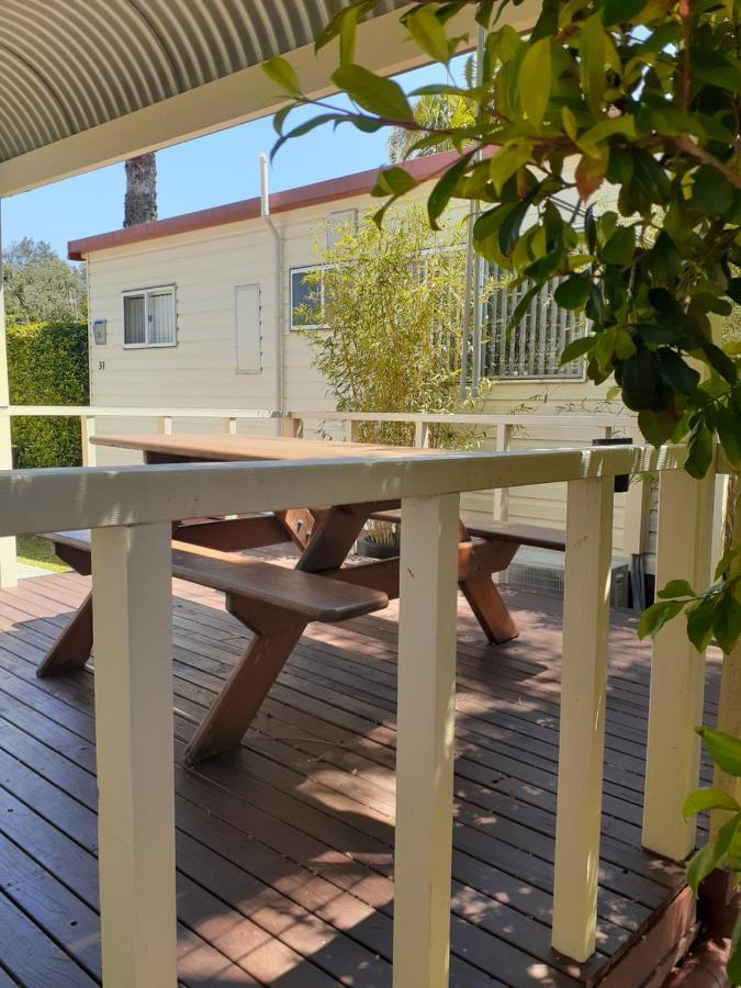 Melaleuca Caravan Park พอร์ตแมคควอรี ภายนอก รูปภาพ