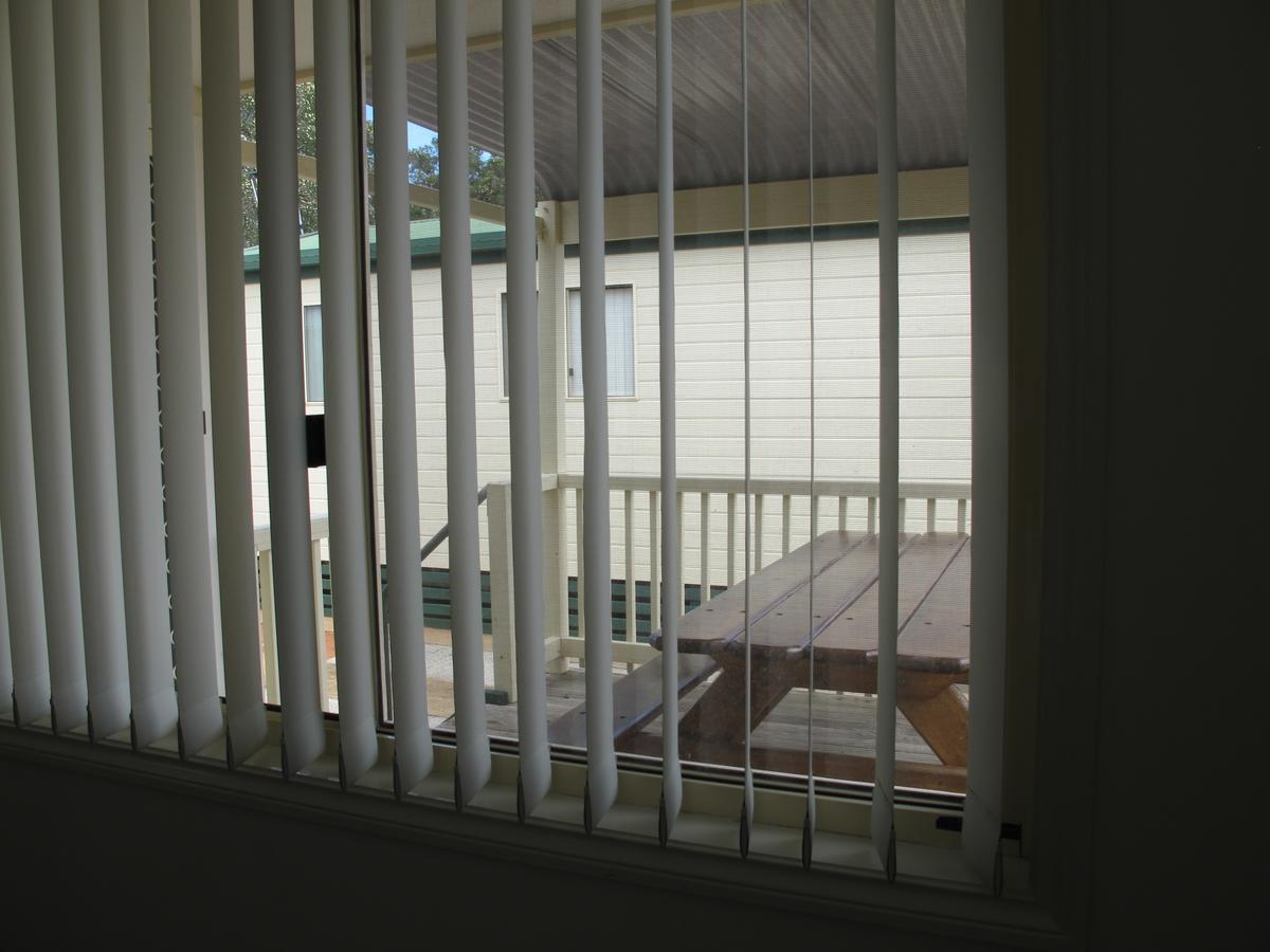 Melaleuca Caravan Park พอร์ตแมคควอรี ภายนอก รูปภาพ