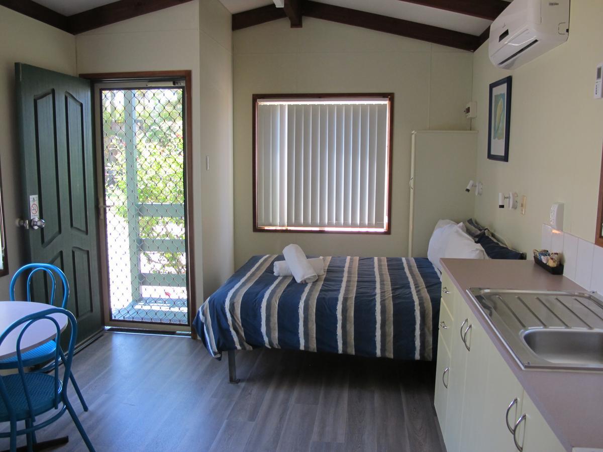 Melaleuca Caravan Park พอร์ตแมคควอรี ภายนอก รูปภาพ